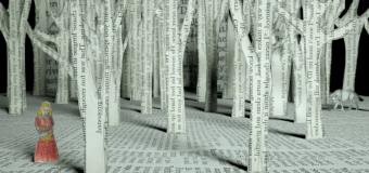pages from a book cut into the shape of trees