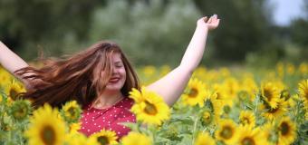 Zandra Matthews amid flowers