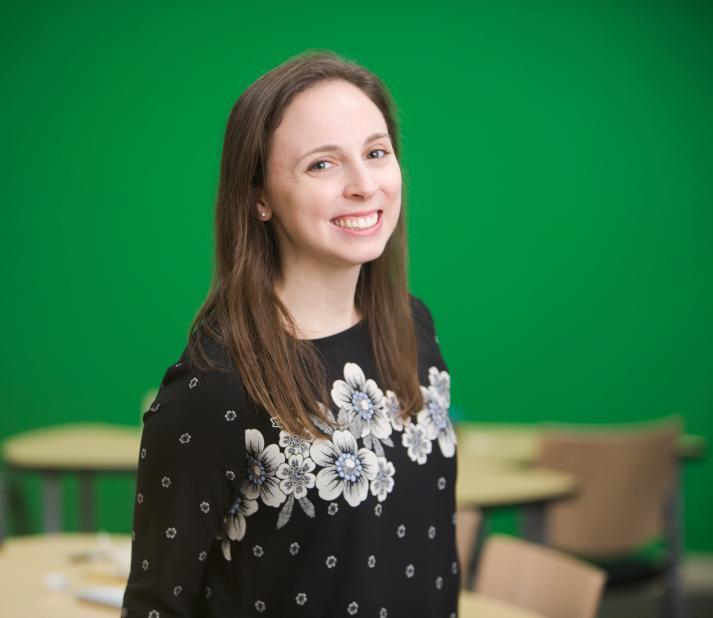 moving up in education field smiling teach alum from graduate school of education lesley university