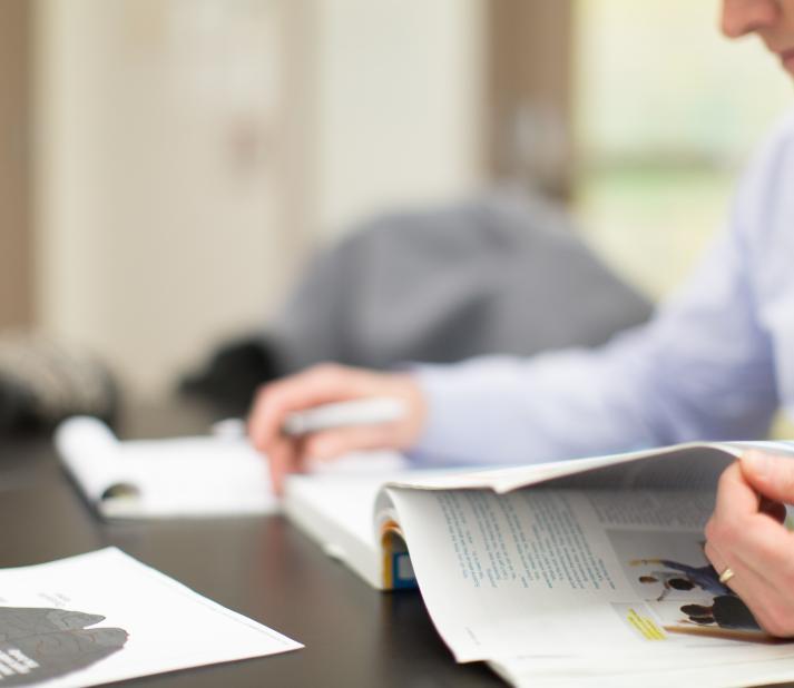 graduate student reading close up 