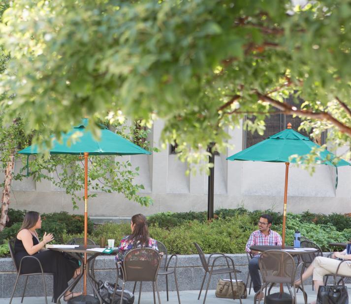 graduate students sitting outside