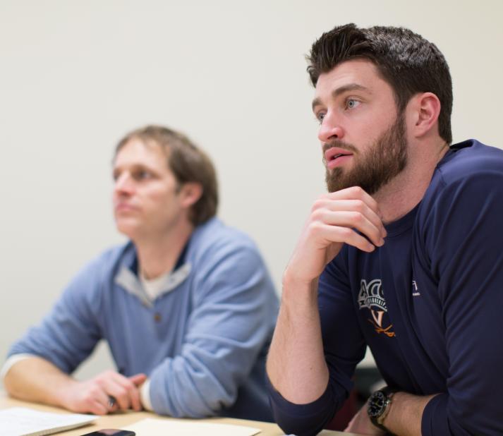 2 students in a graduate classroom 