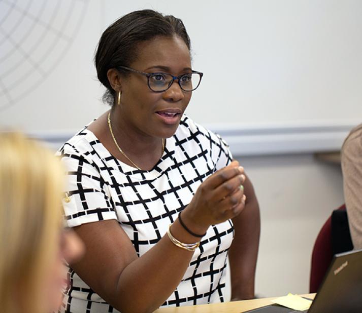 Three students participating in class discussion