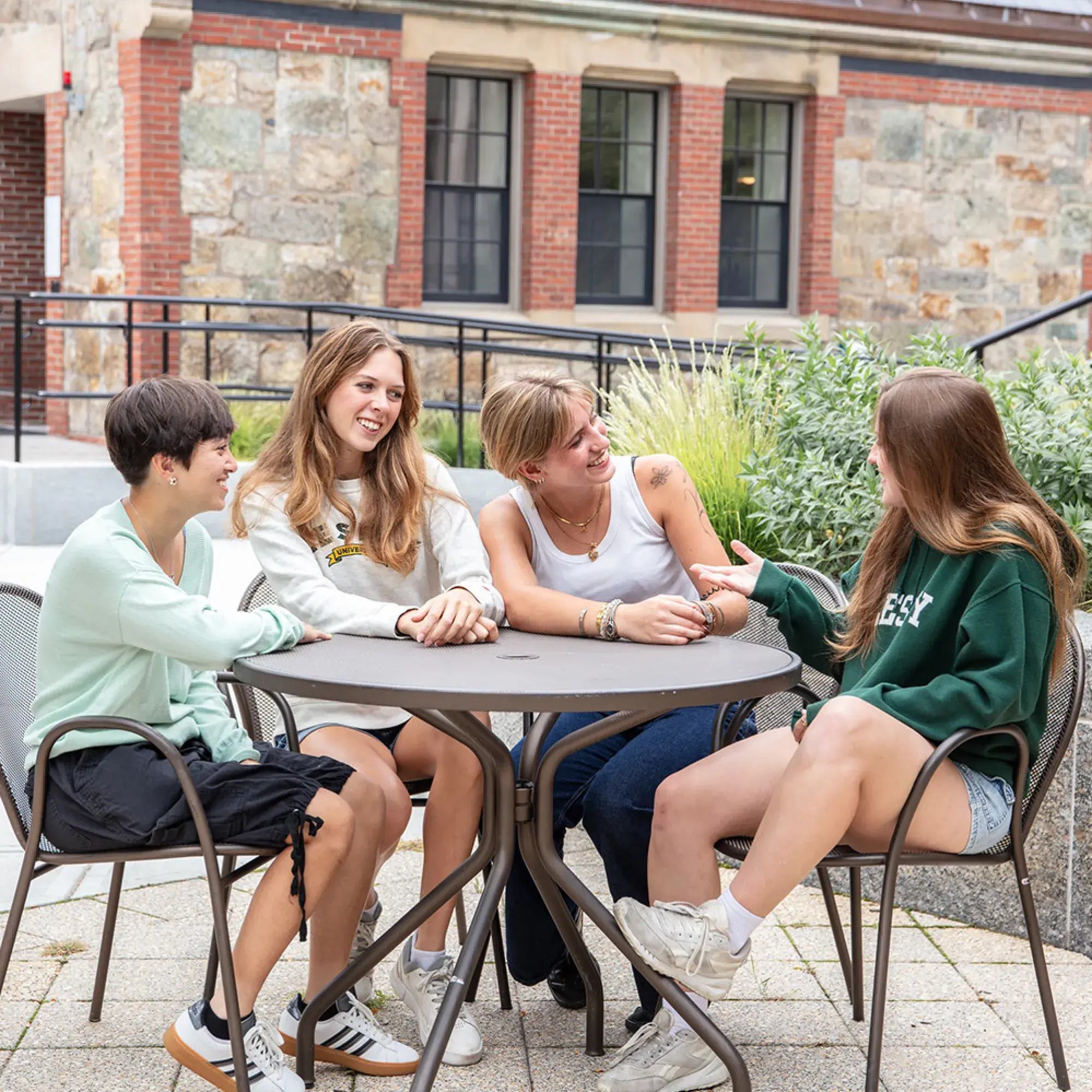 students at table laughing