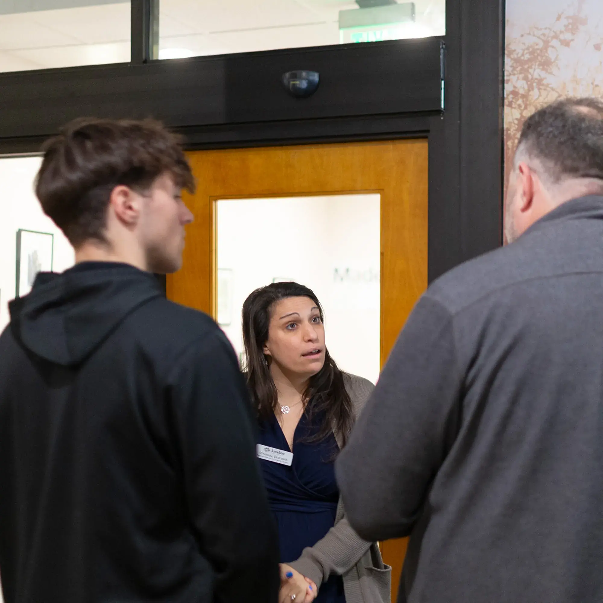 students and faculty talking
