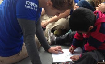 Lana Sommers, Lesley University alum, volunteering with children abroad