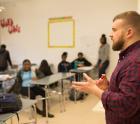 male teacher in front of the classroom