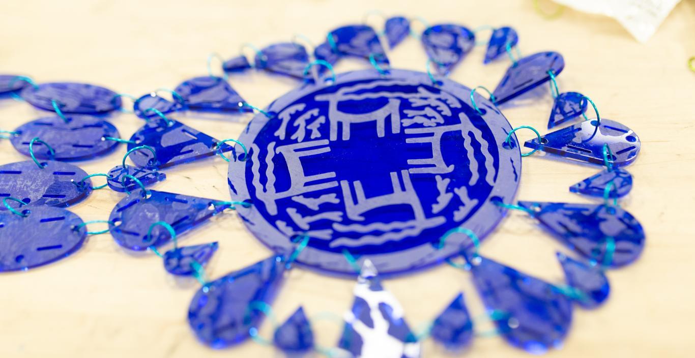 blue laser cut shapes