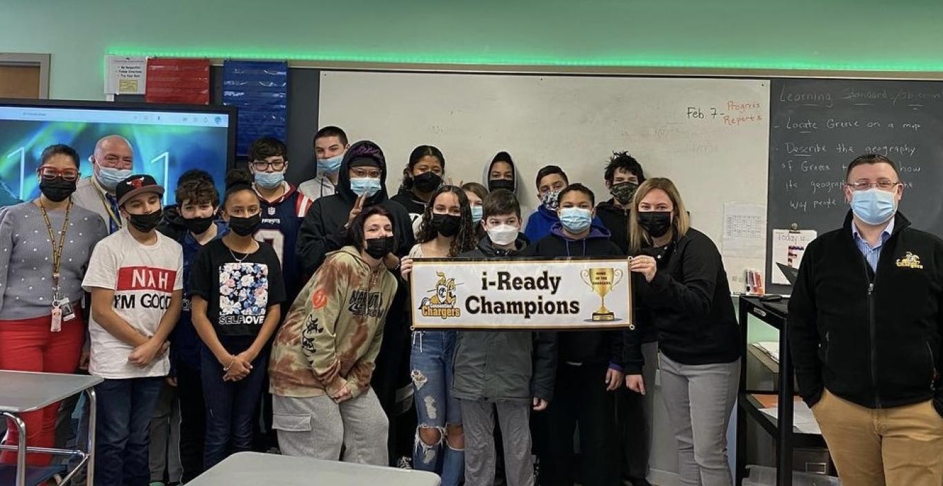 Amy Maldonado '22 (far left) with her students at Consentino Middle School