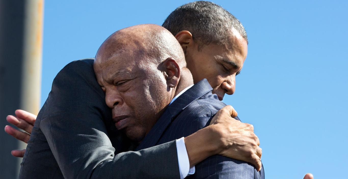 Barack Obama hugs John Lewis