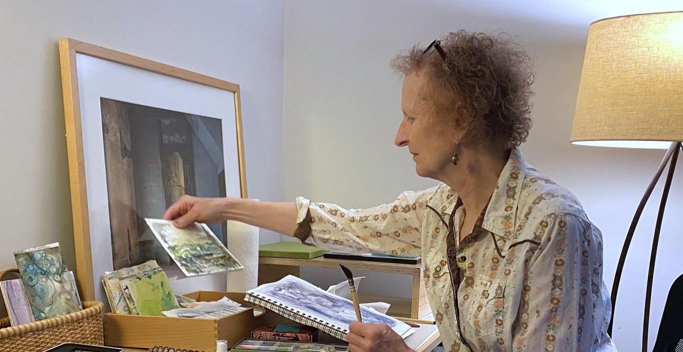 Debe Hale at desk