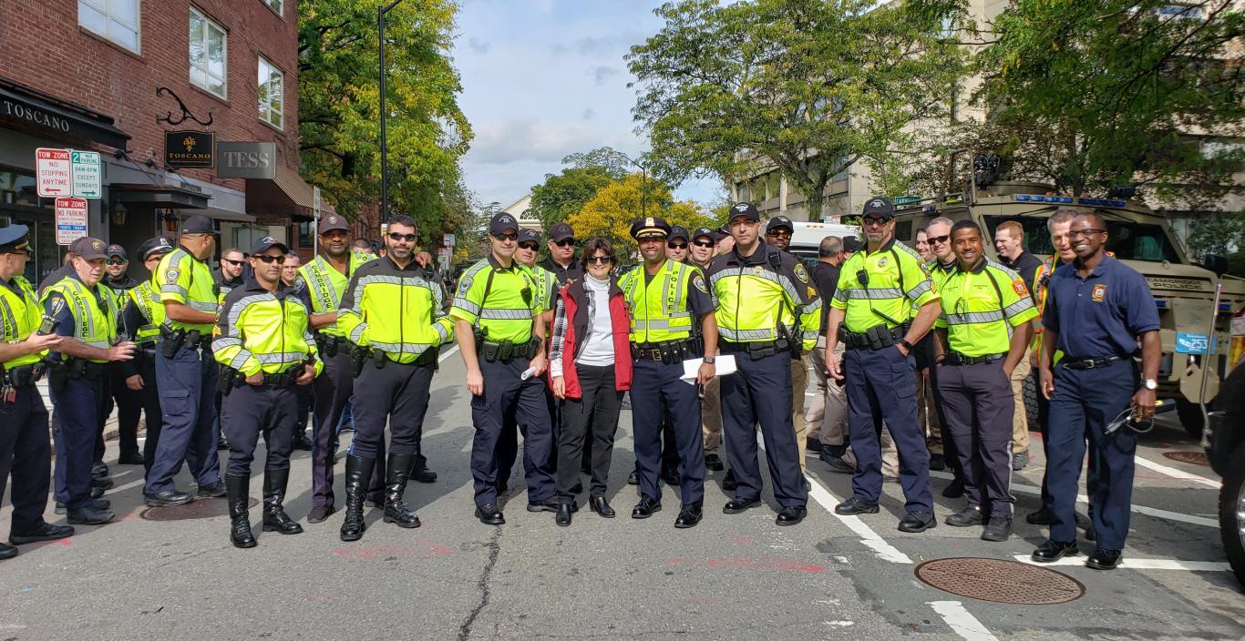  Denise Jillson, the Executive Director of HSBA, posing with Cambridge police.
