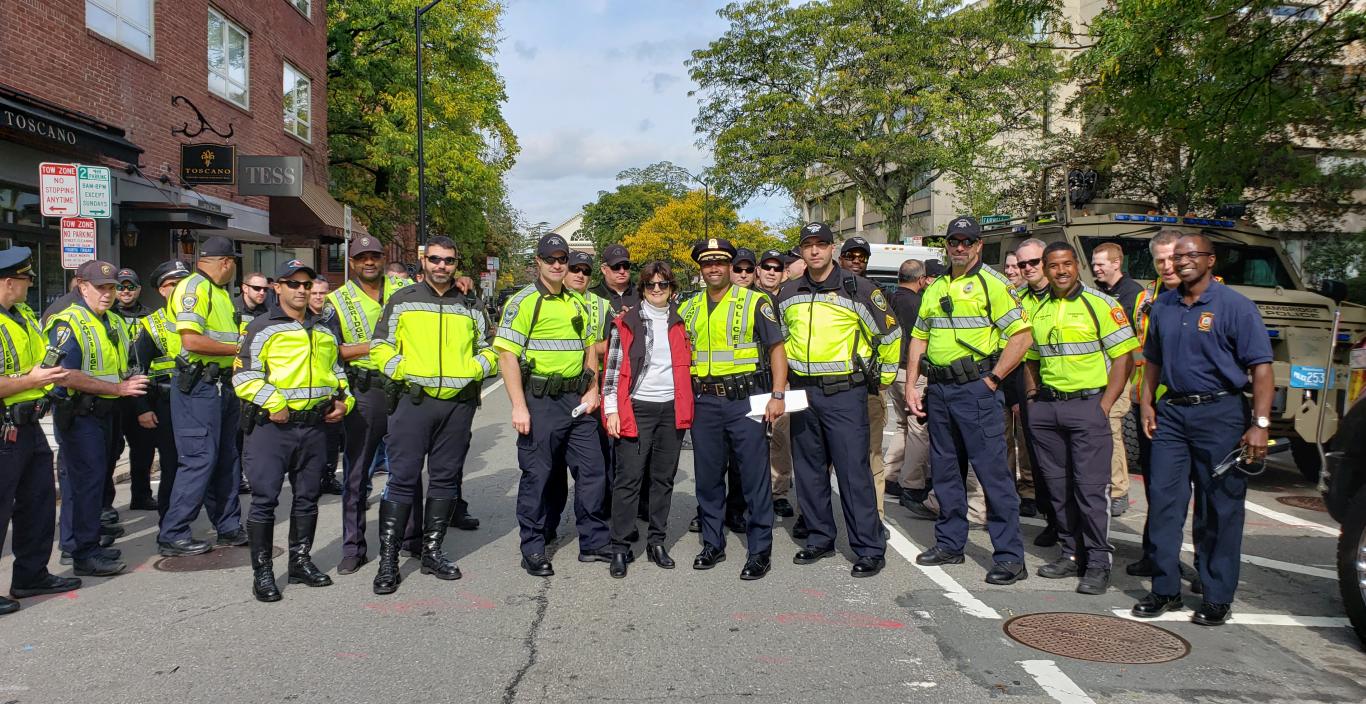  Denise Jillson, the Executive Director of HSBA, posing with Cambridge police.