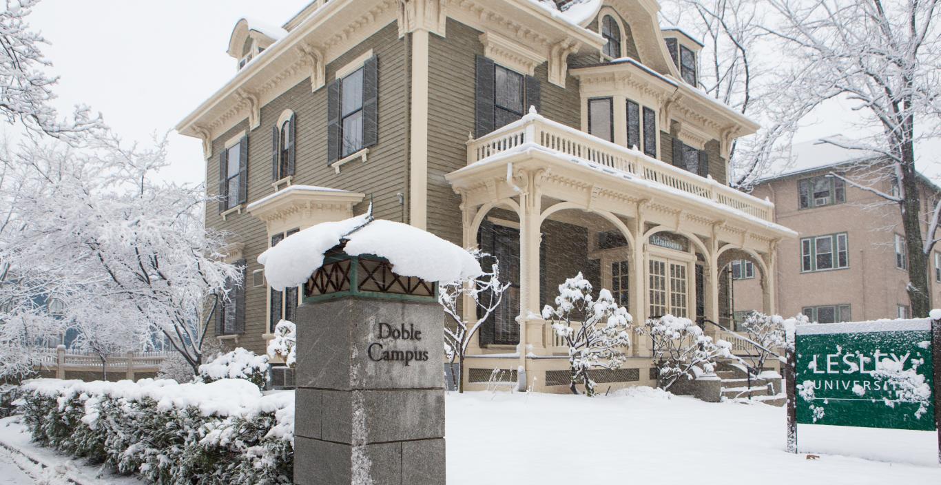 Lesley admissions building covered in snow.