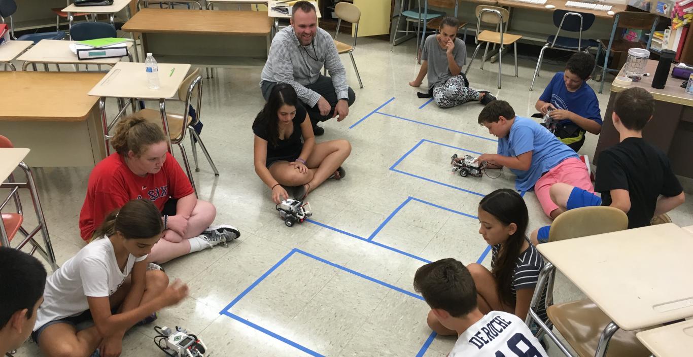 elementary Robotics class testing their robots