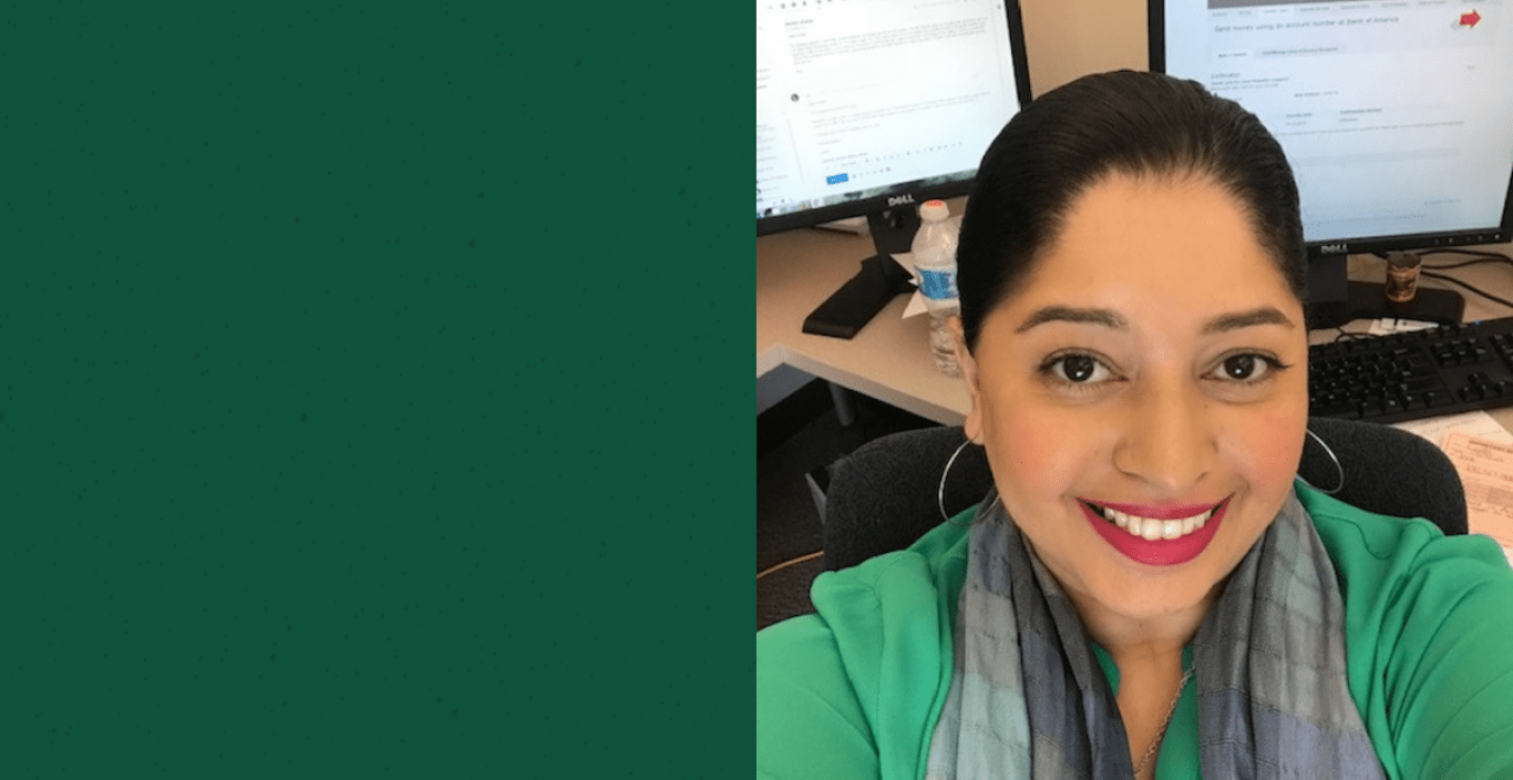 Alumna Lynette Correa-Velez '03 at her desk