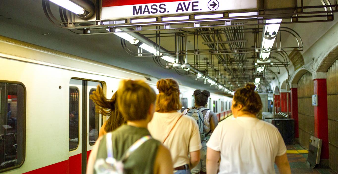Image of people walking on the Red Line train platform