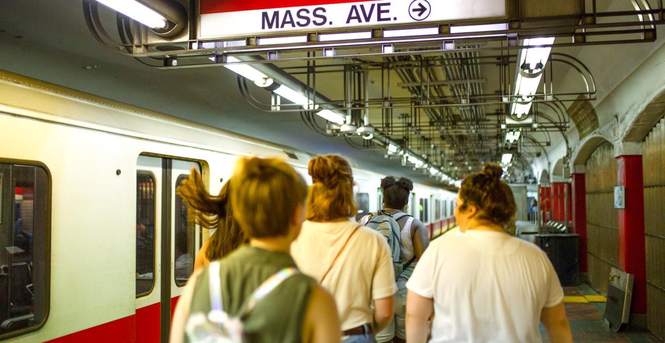 Image of people walking on the Red Line train platform