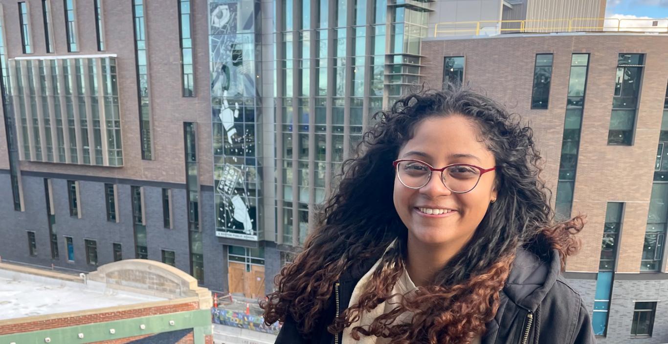 Natalia Reyes with a view of Boston Arts Academy behind her