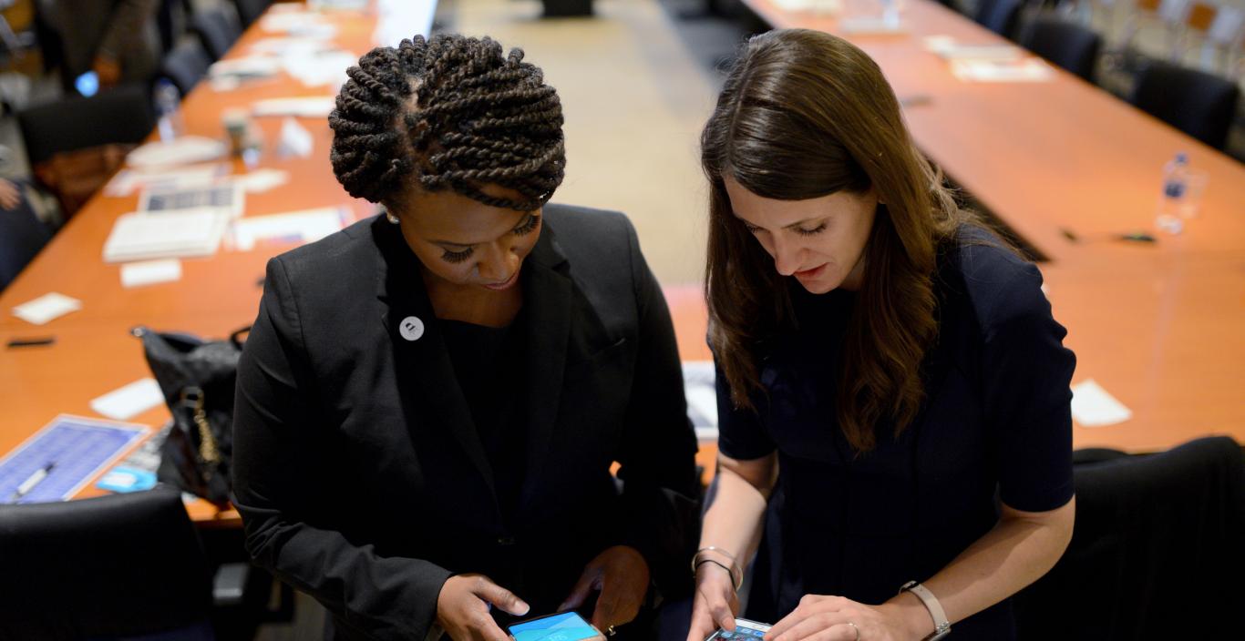 Sarah Groh and U.S. Representative Ayanna Pressley working together by Meredith Nierman, WGBH News