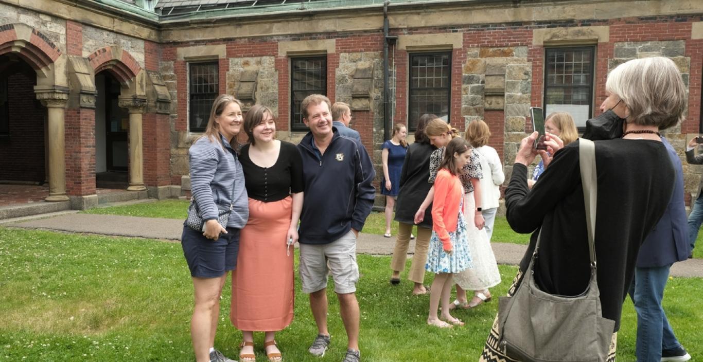 students pose for photos