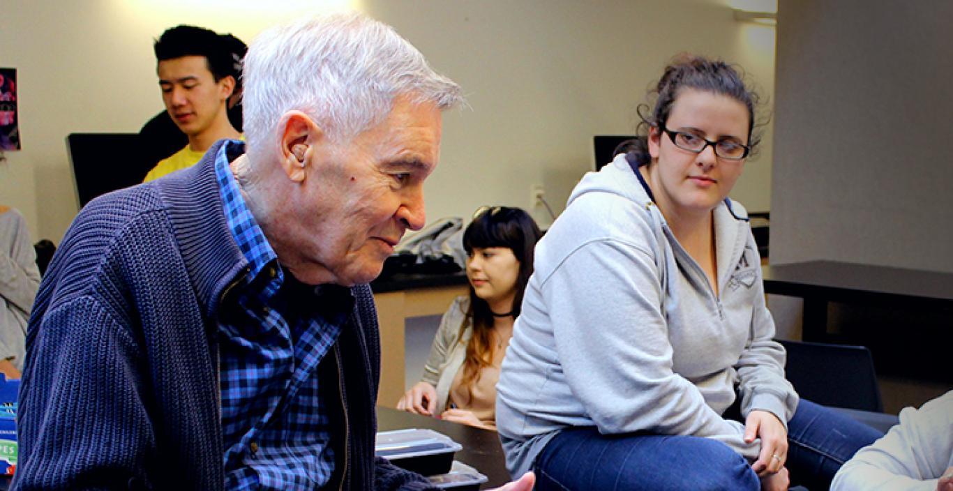 Seniors and students collaborate in user design class.