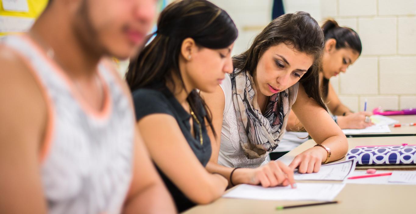 row of students in class at table