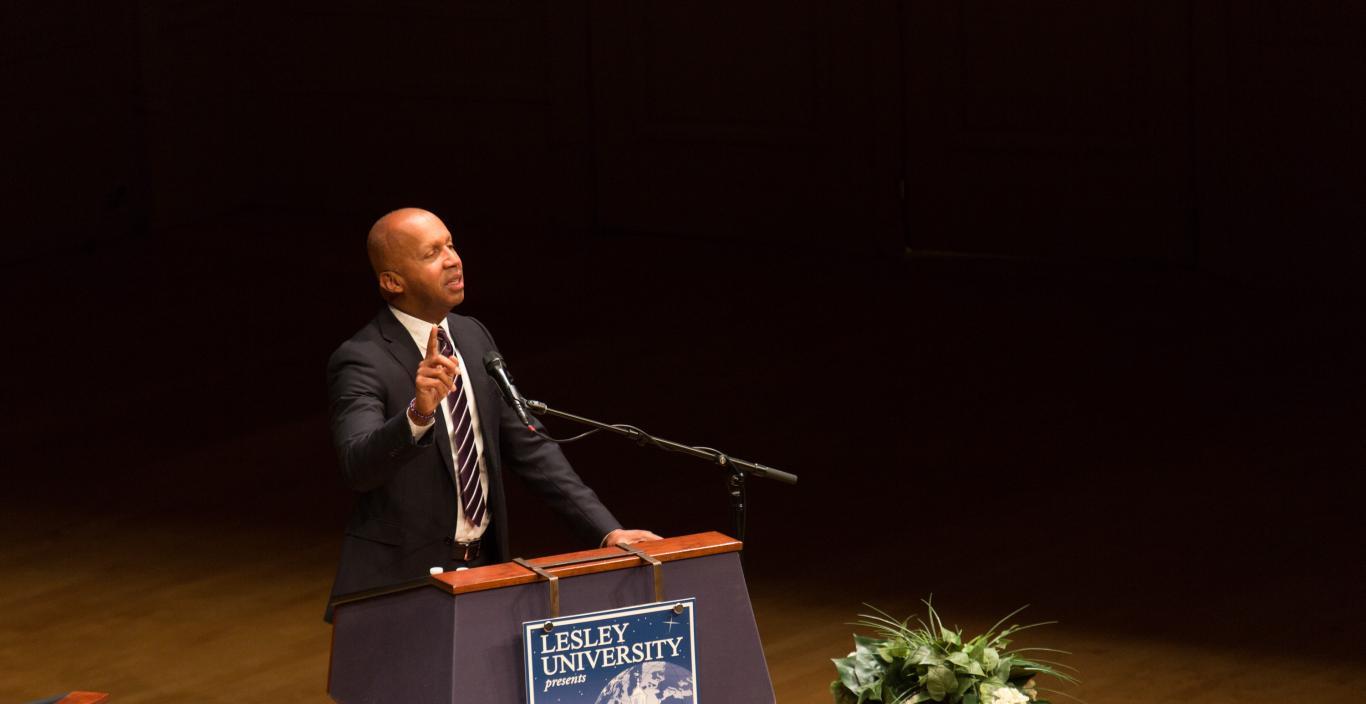 Bryan Stevenson speaks at the podium