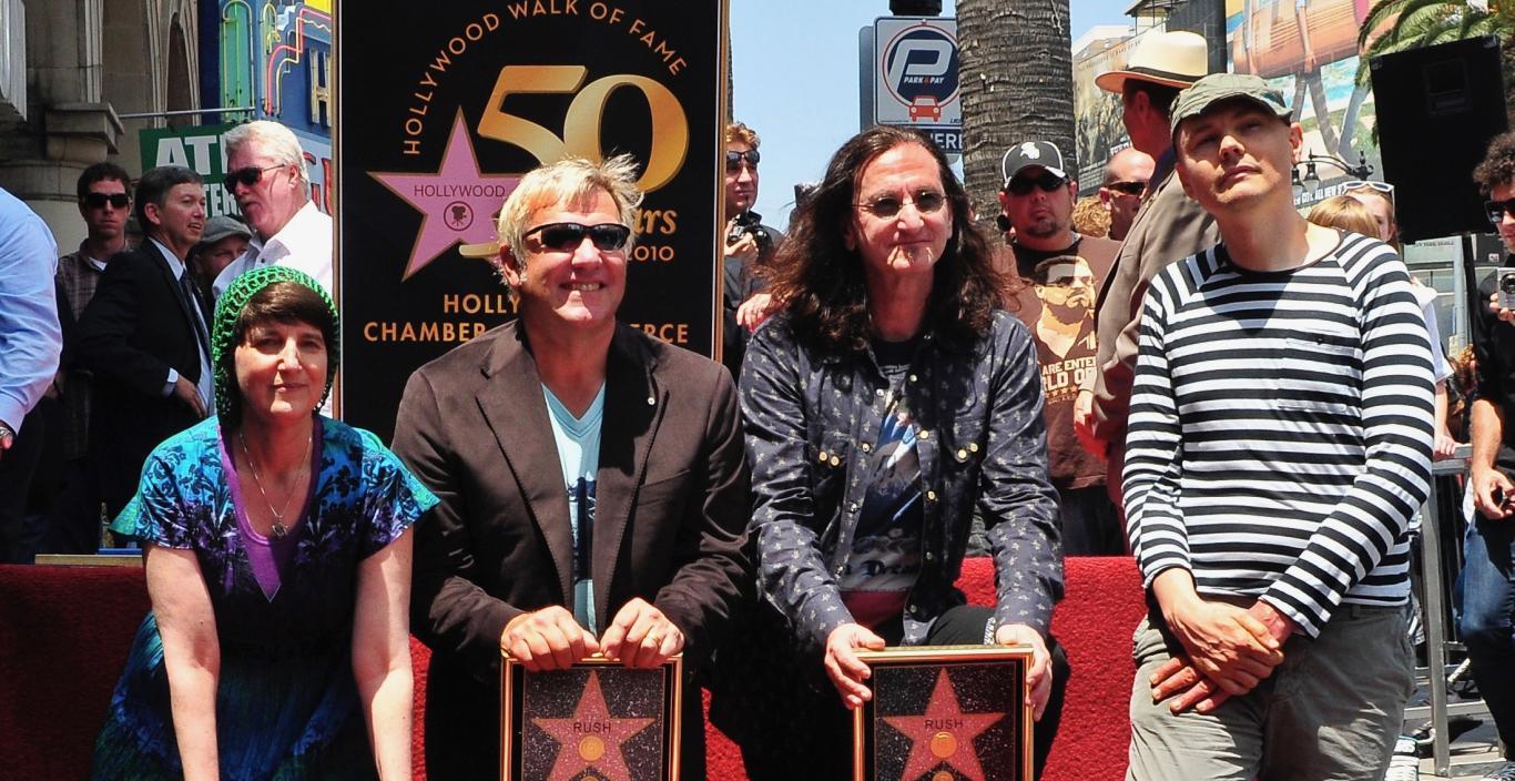 Donna Halper with the band Rush