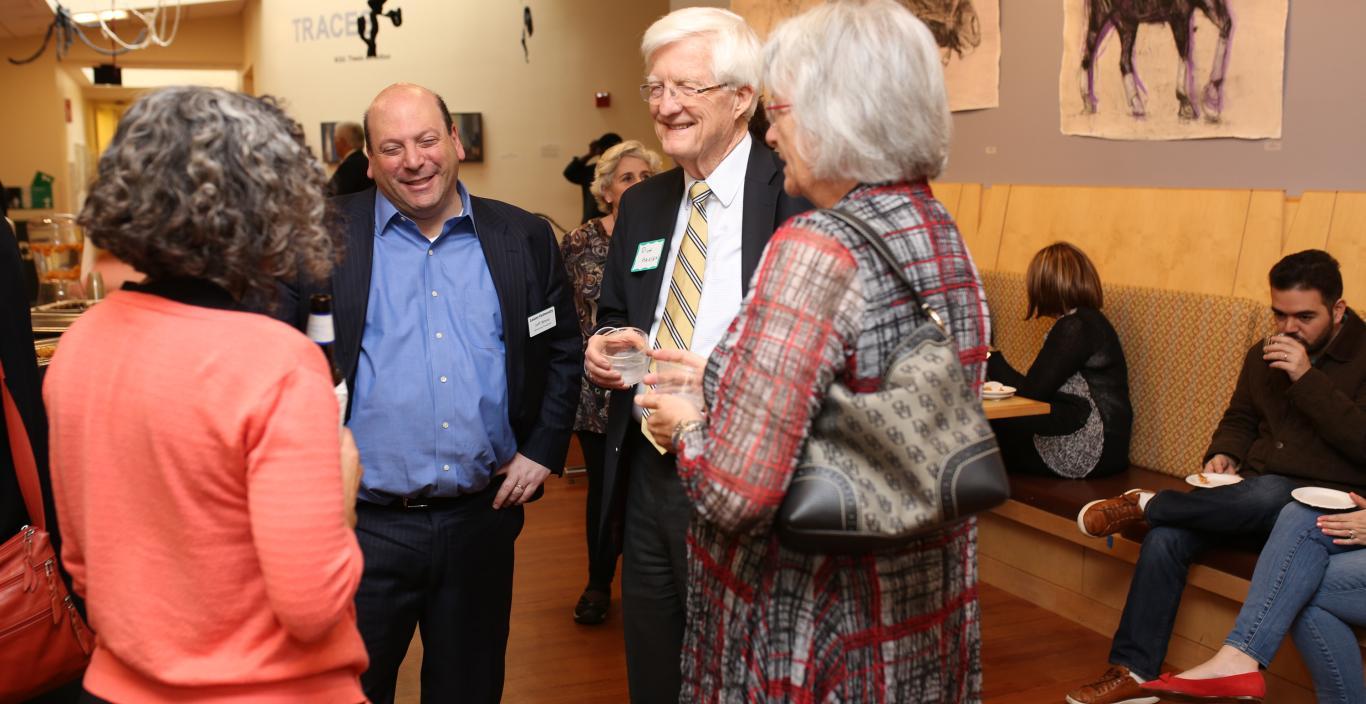 President Weiss and Provost Hansen at a gathering at University Hall. 