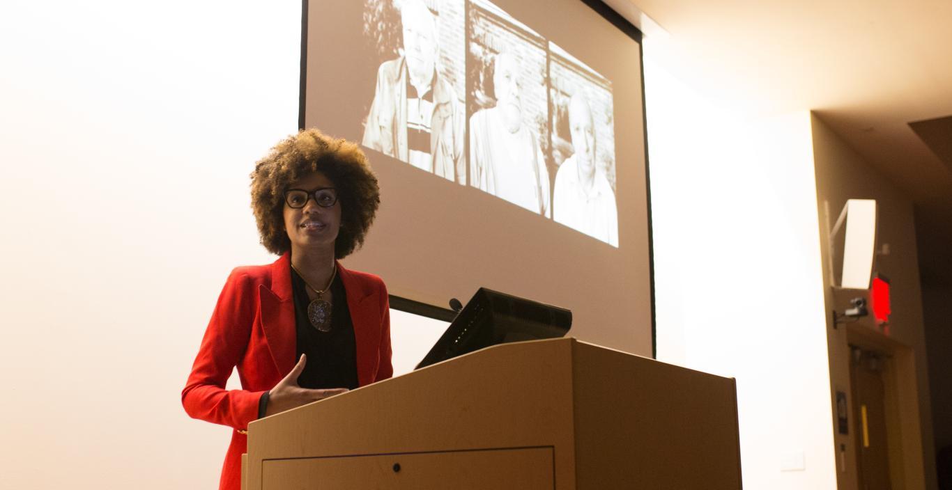 Latoya Ruby Frazier speaks at a podium.
