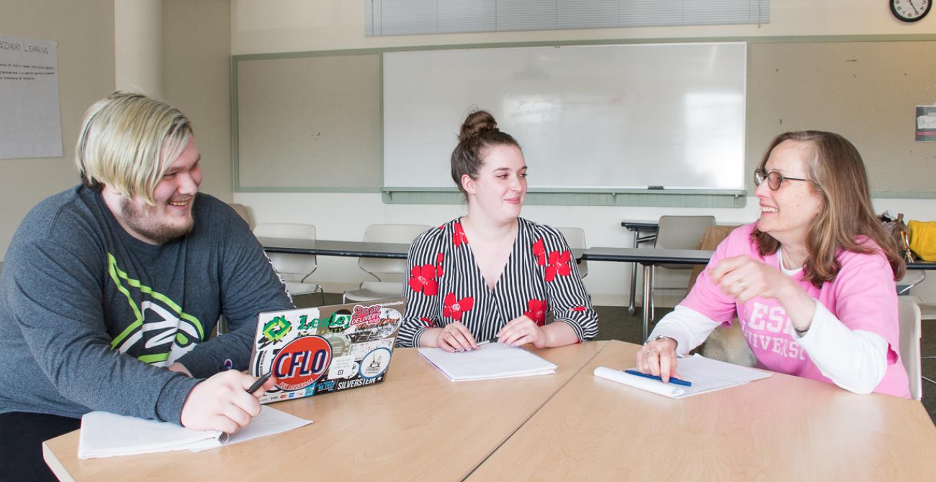 Jo-Anne Hart (right) discusses history with students.