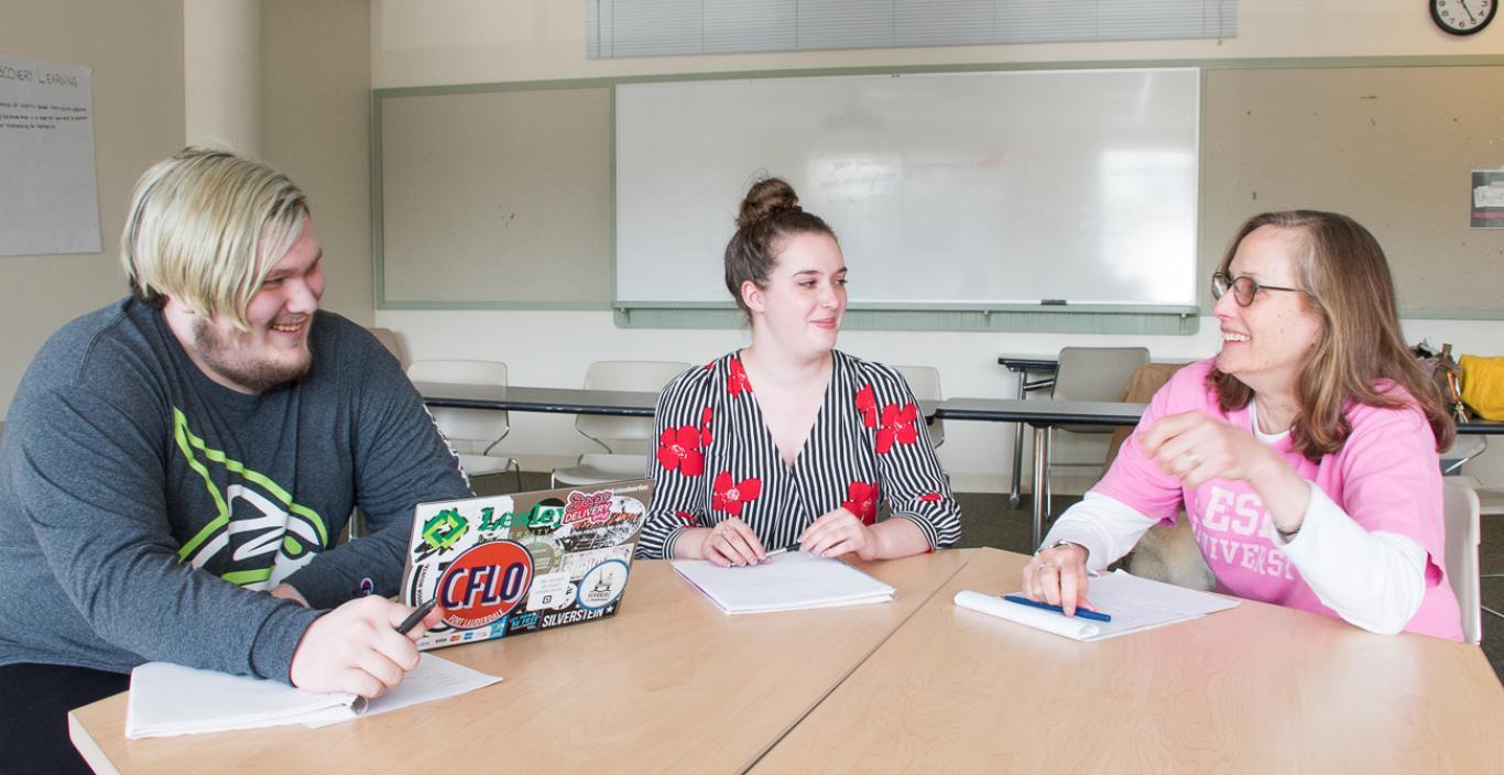 Jo-Anne Hart (right) discusses history with students.