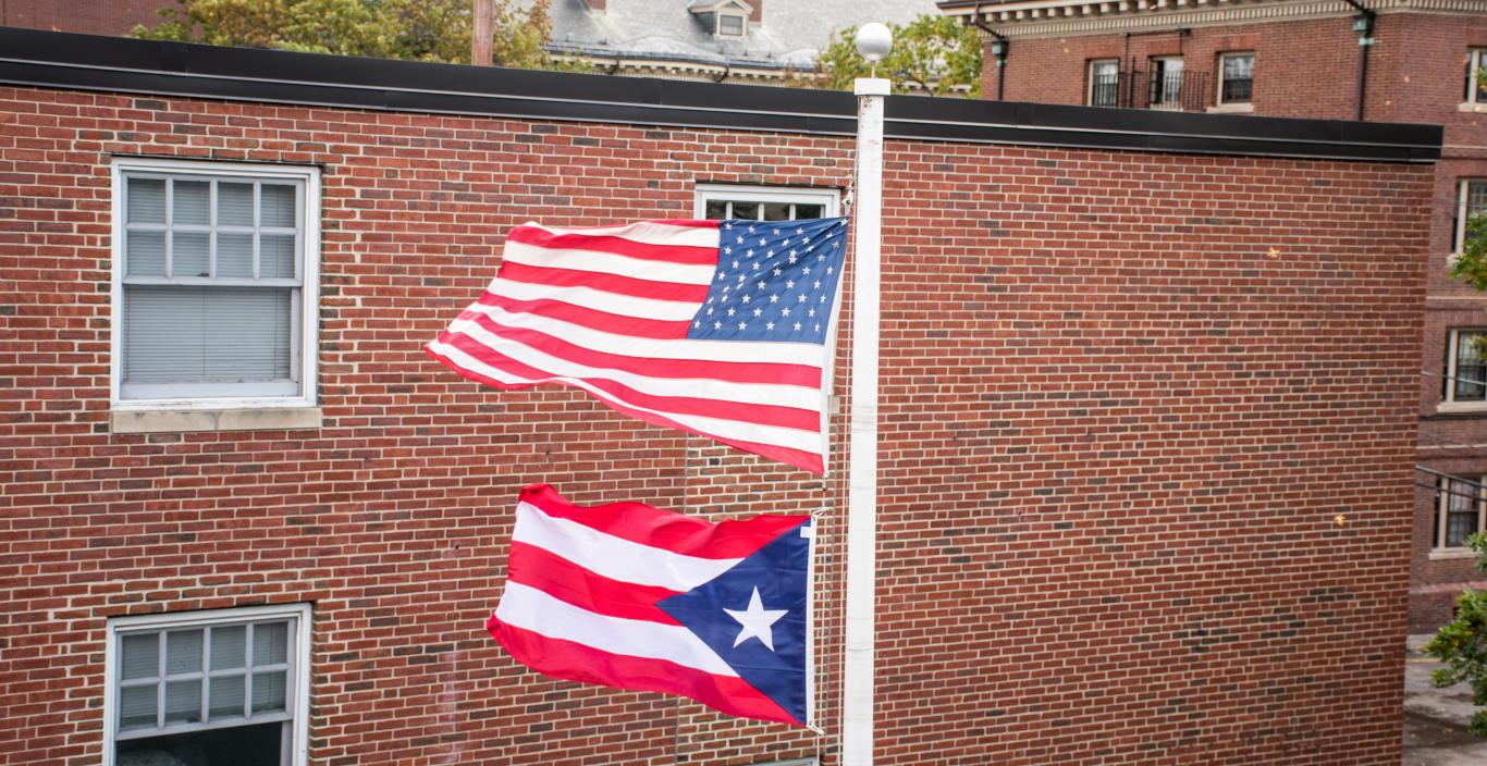 The Puerto Rico flag flies below the American flag on campus.