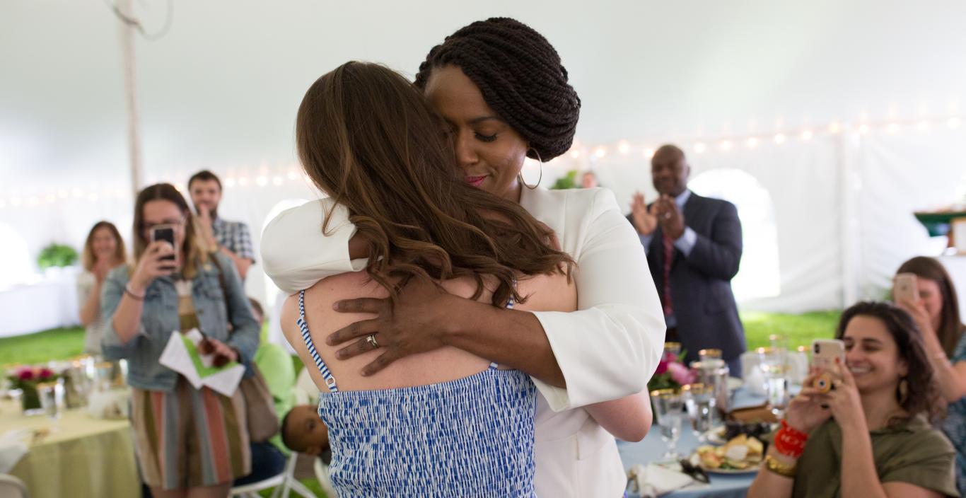 Ayanna Pressley hugs Sarah Groh