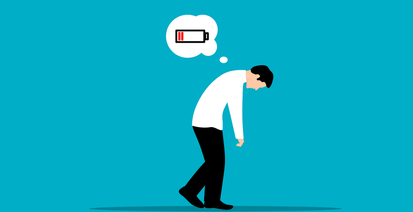 Clipart of a white man walking with his back bent and head down, a dead battery symbol over his head in a thought bubble.