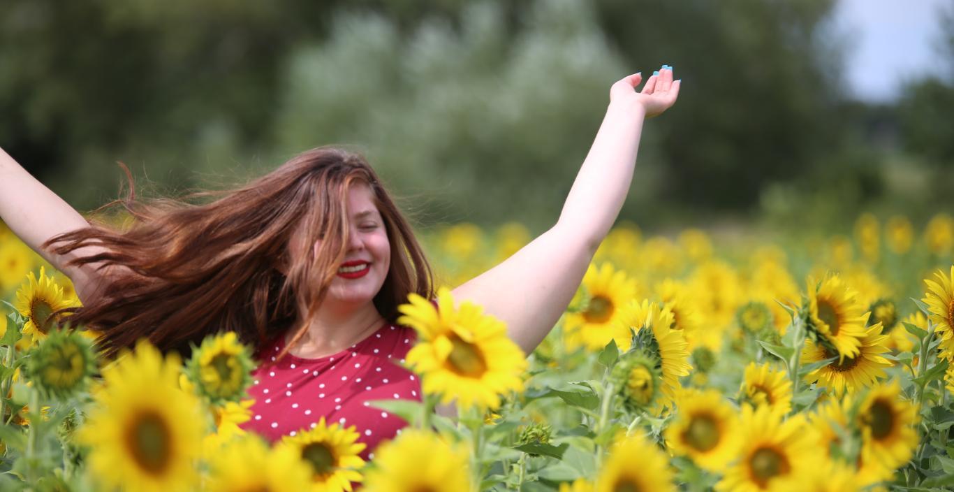 Zandra Matthews amid flowers