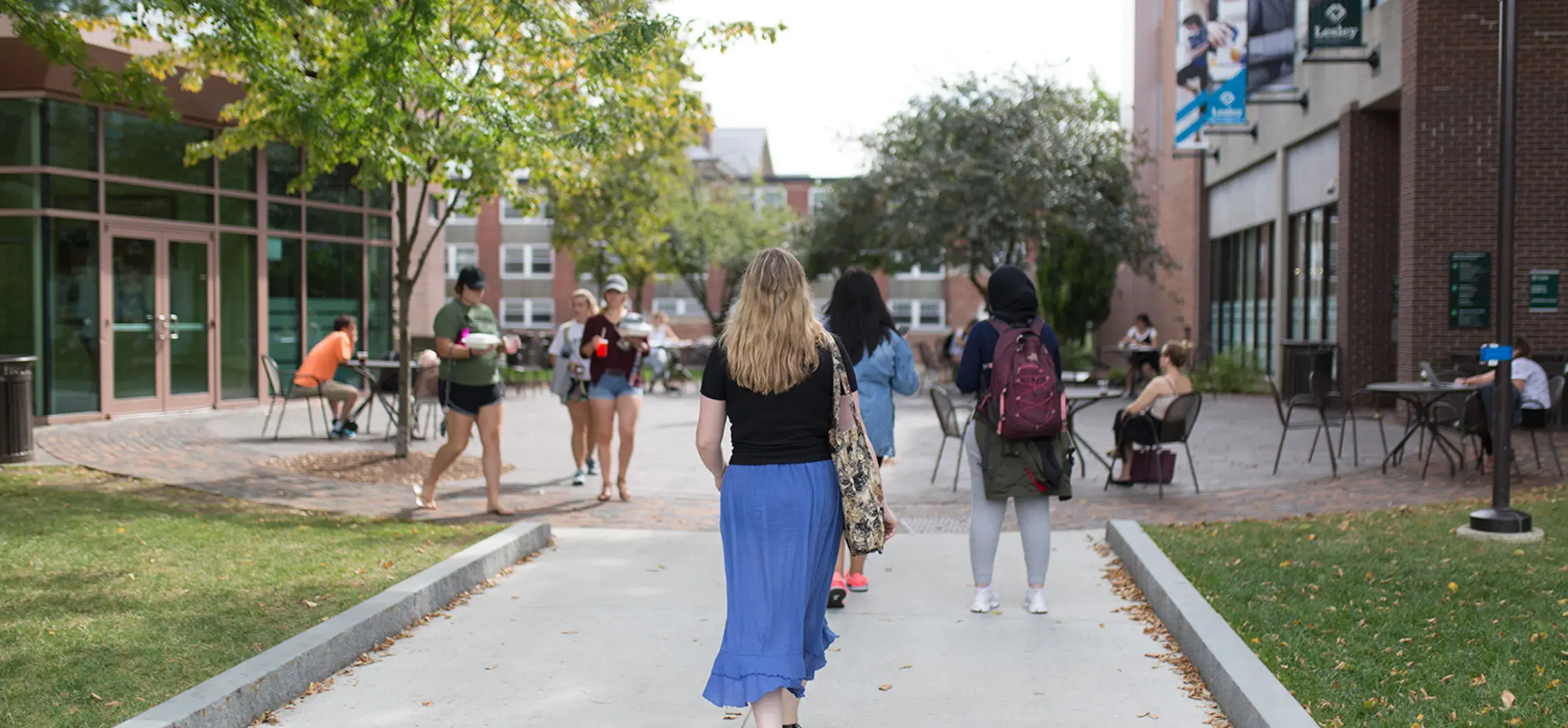 woman walking on campus