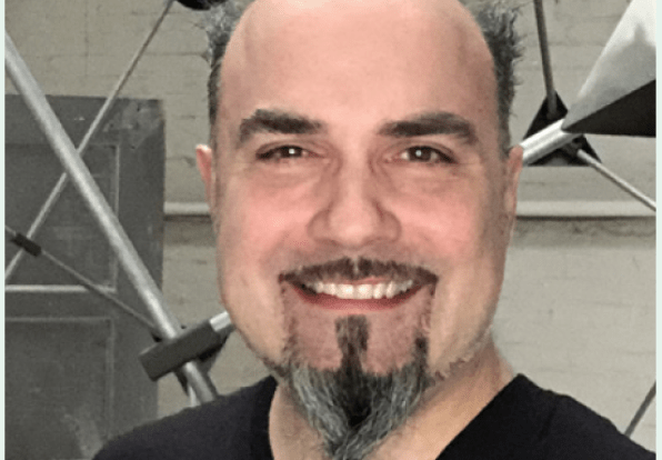 A headshot of Derek Hoffend
