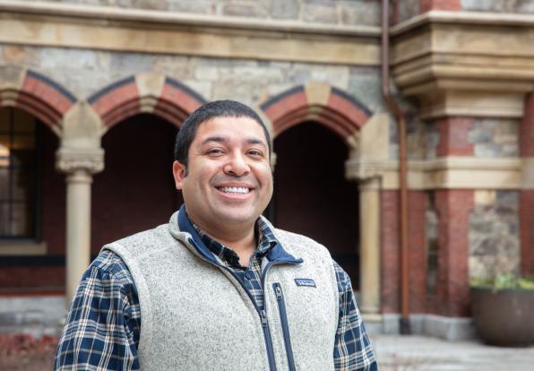 Matt Jones smiling in front of Lesley building