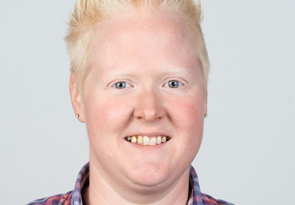 Headshot of Shawn Kithcart. Shawn wears a plaid button-down and has short, pale blonde hair.