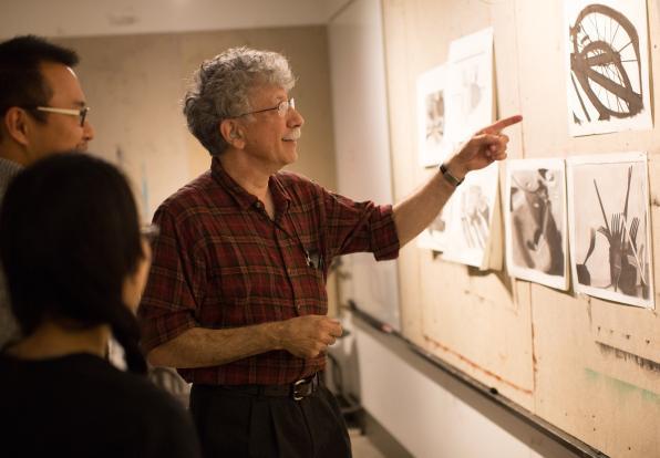 professor giving an art crit