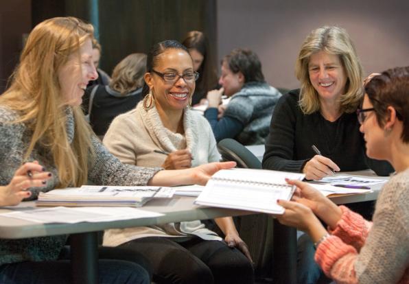 group of women working at table
