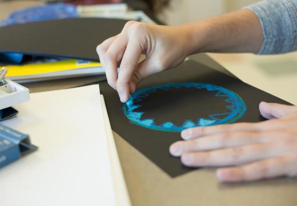 close up of hand drawing a mandela