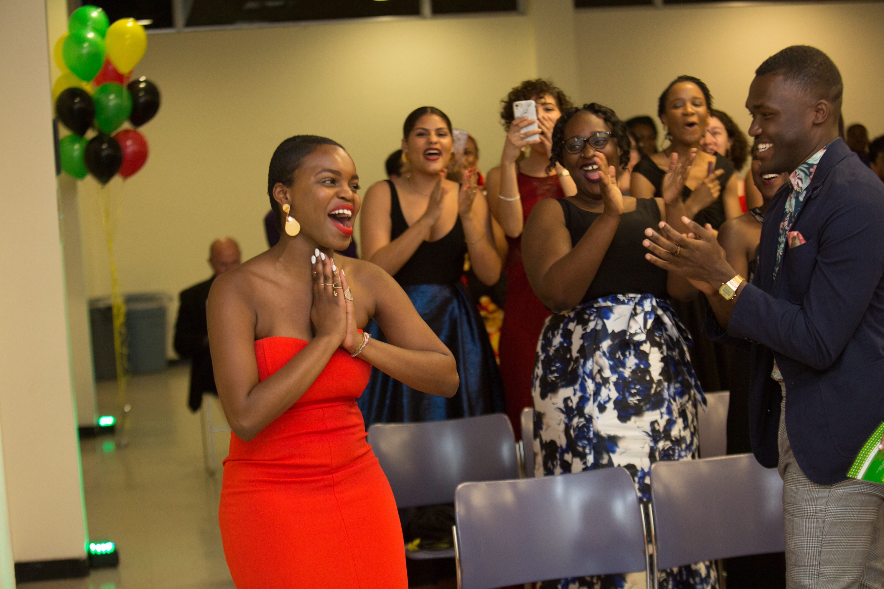 Students give a standing ovation at the Unity Gala for one of the award winners.