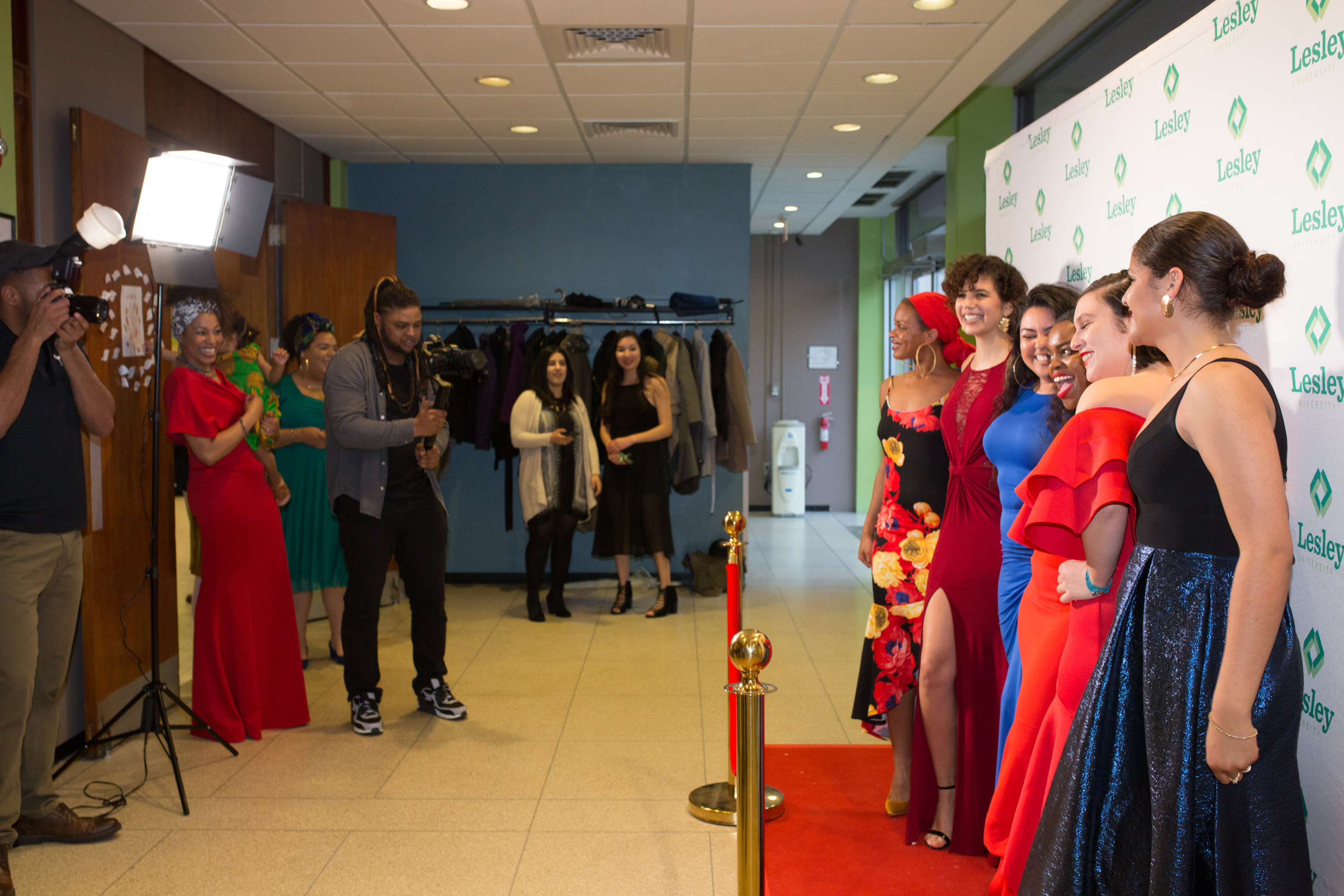 Students pose on the red carpet at the Unity Gala in Washburn Hall.