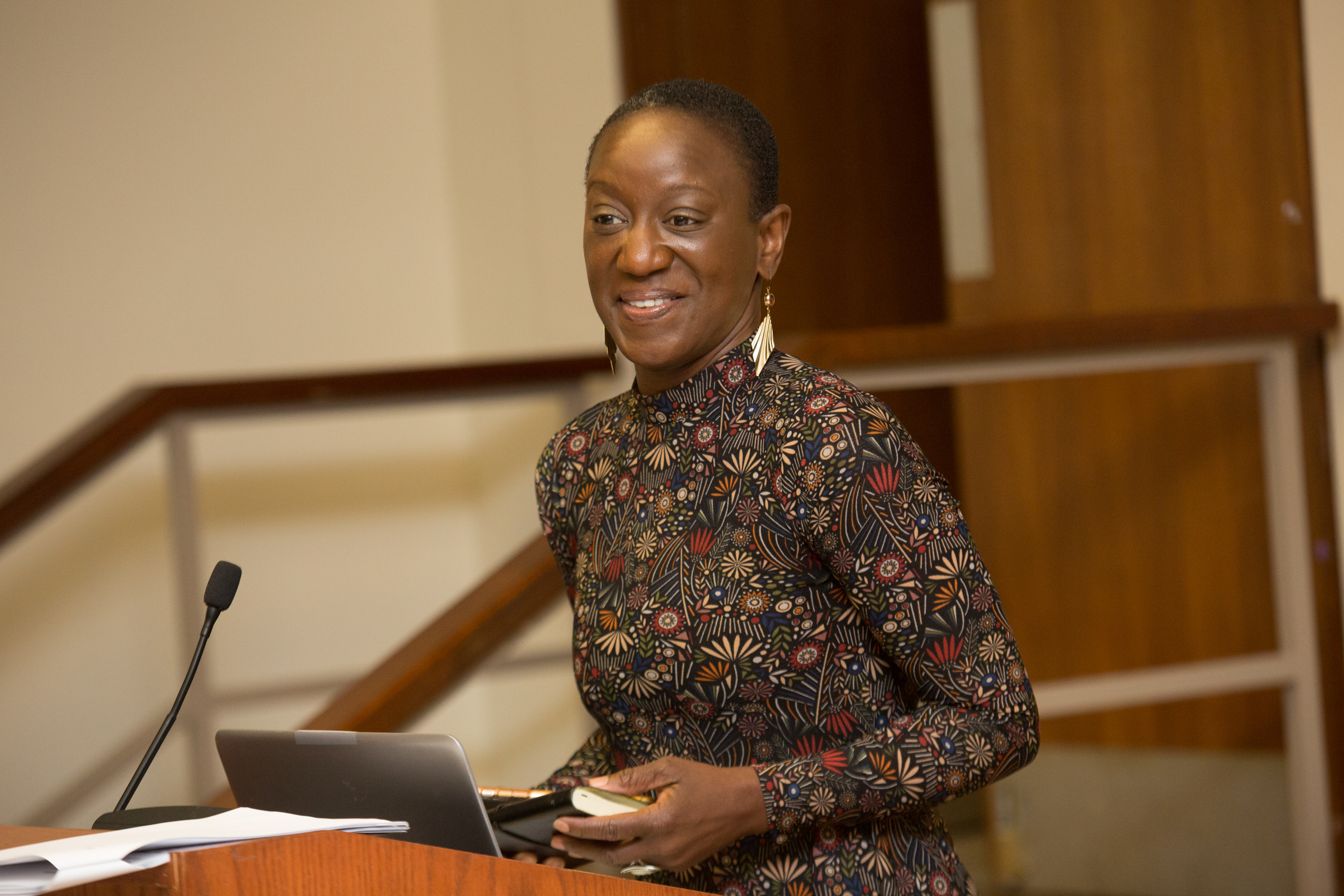 Unity Gala keynote speaker Rev. Karlene Griffiths Sekou at the podium making a speech.