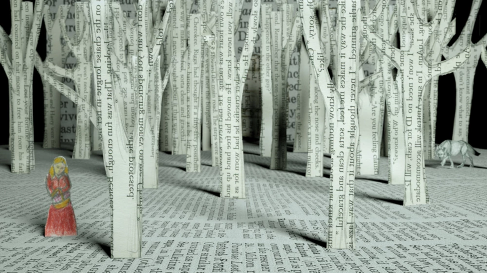 pages from a book cut into the shape of trees